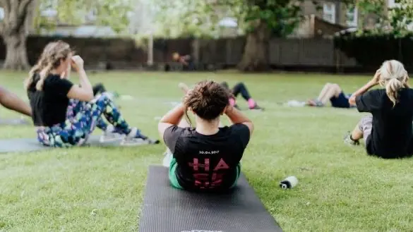 Group fitness session in East London park